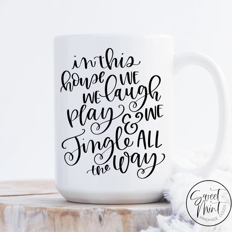 In This House We Laugh Play And Jingle All The Way Mug