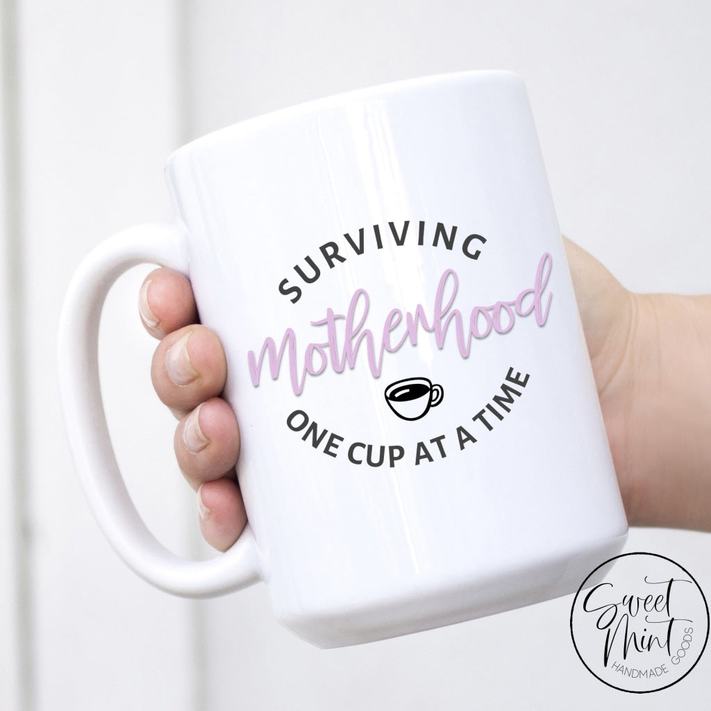 Surviving Motherhood One Cup At A Time Mug